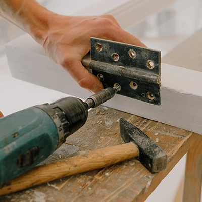 Installing a hinge on a door